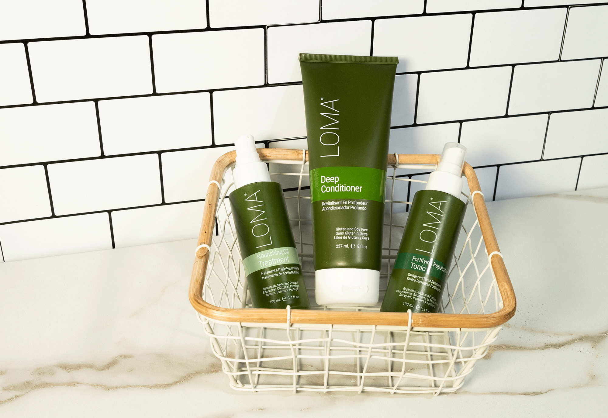 Loma hair treatments such as Nourishing Oil Treatment, Fortifying Repairative Tonic, and Deep Conditioner.