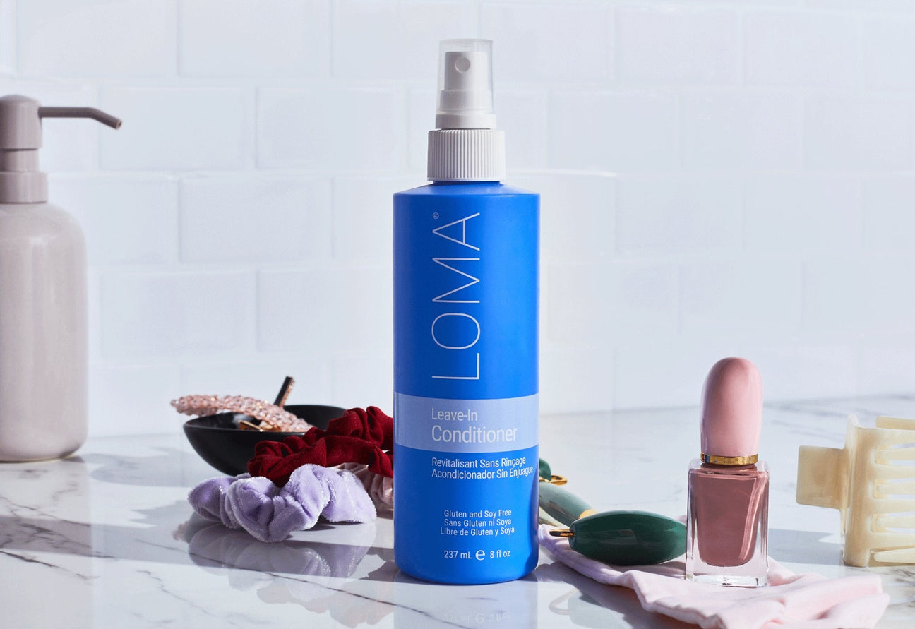 Loma curly hair care such as Firm Hold Gel, Fiber Putty, Finishing Spray, and Calming Crème.
